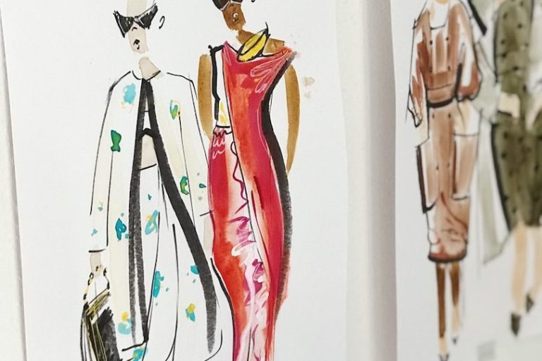 Fashion Design course Group working on fashion sketches, trend development, and design concepts, showcasing collaboration in a Fashion Design course.